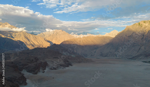 Aerial top view of desert in Karakoram high mountain hills. Nature landscape background, Skardu, Gilgit, Pakistan. Travel on holiday vacation.