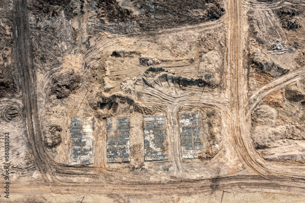 Obraz premium aerial top view of construction site during the earthworks. leveling of construction area.