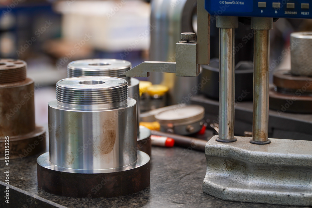 row of height gauges in an engineering lab,Caliper height gauge on