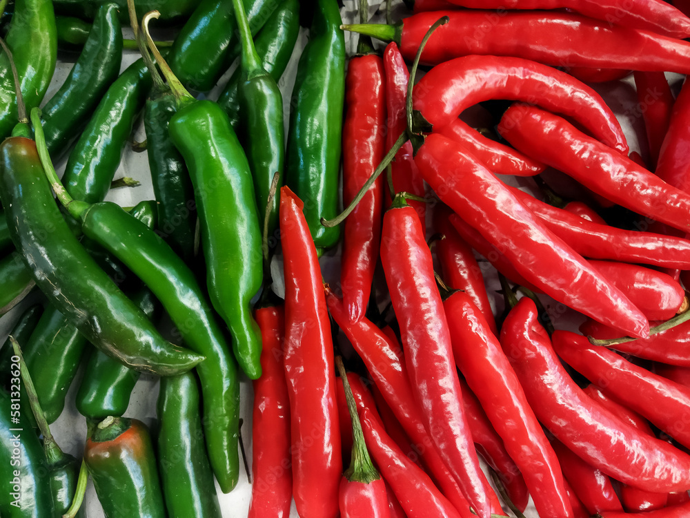 a pile of Asian red chilies and green chilies