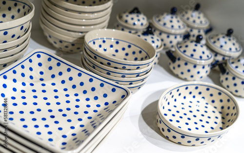 Closeup handmade pottery with blue pattern produced in Boleslawiec, Poland