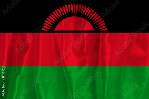 Free Download The Malawi flag on a silk background is a great national symbol. Texture of fabrics The official state symbol of the country - GFXLoad