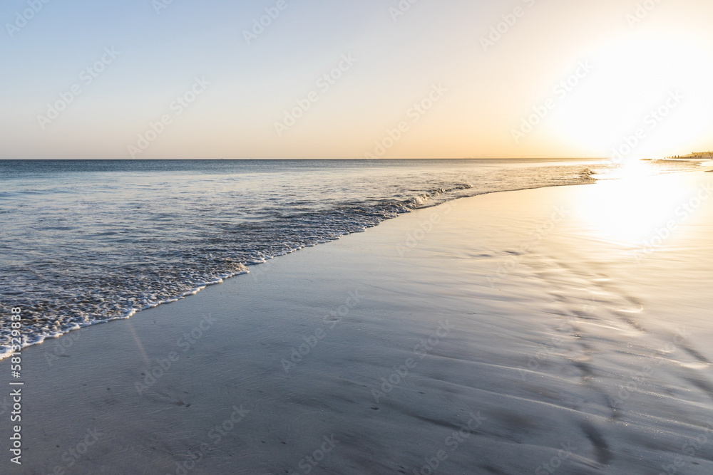 Obraz premium evening white sand beach in Salalah, Sultanate of Oman