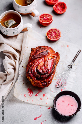 Canvas Print blood orange earl grey and cardamom bun..selective focus