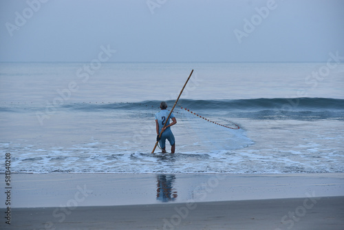 fisher man on the beach 