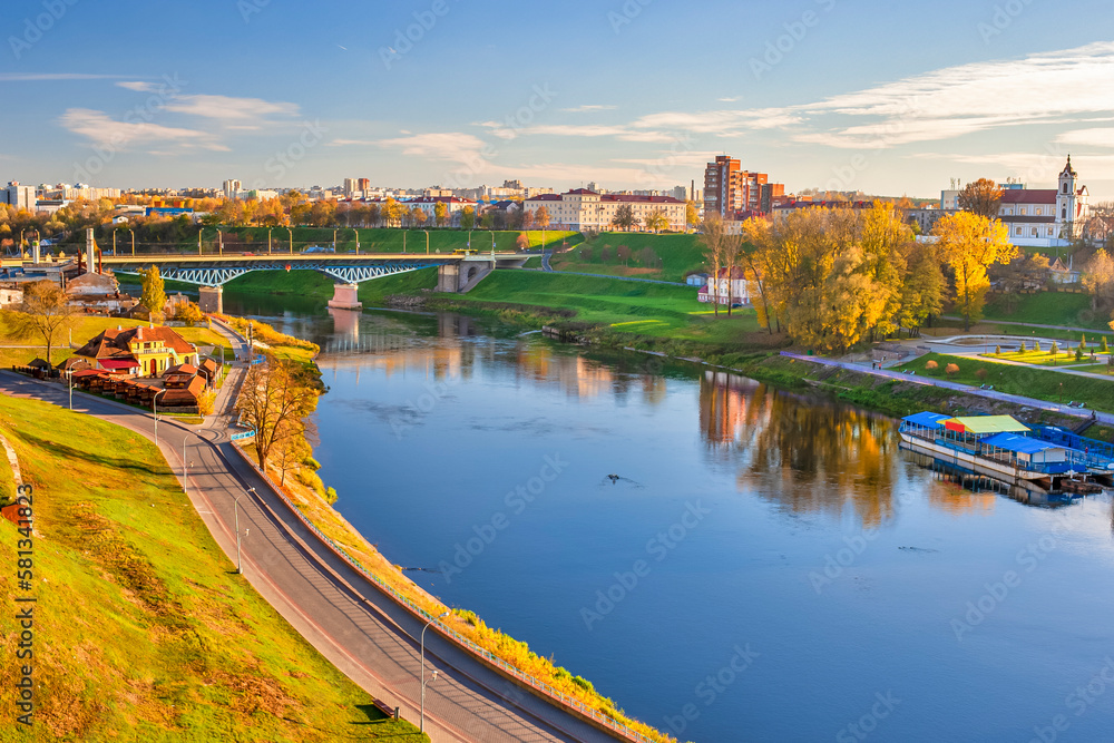 Belarus Traveling. Grodno City Skyline with Traffic Bridge and Catholic Church Across The Neman River