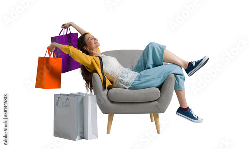 Cheerful shopaholic woman with shopping bags photo