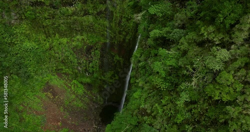 Aerial Revealed Waterfall And Lush Jungle In Levada Caldeirao Verde, Madeira, Portugal. photo