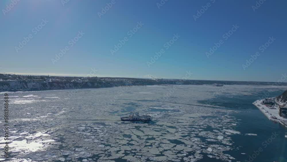 drone shot, boat crossing st lawrence river in winter part 1 drone shot, boat crossing st lawrence river in winter part 1