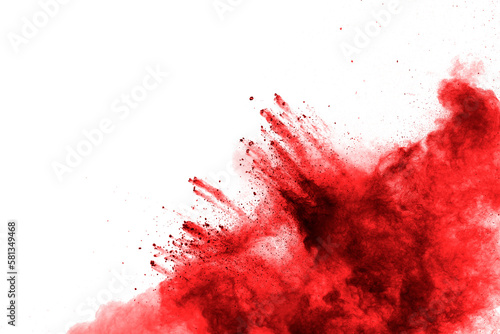 Red powder explosion on white background. Red powder explosion.Freeze motion of red dust particles splash.
