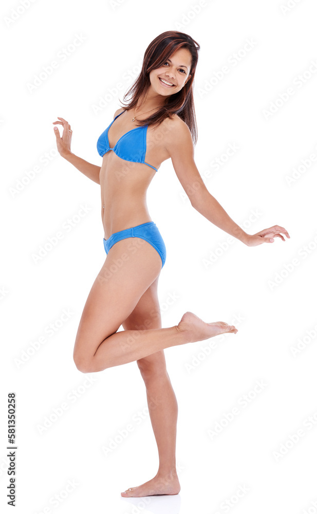 Showing off her summer body. Full length portrait of a beautiful young woman posing in a bikini against a white background. Showing off her summer body. Full length portrait of a beautiful young woman posing in a bikini against a white background.