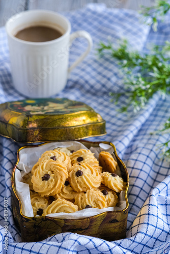 butter cookies or kue semprit on the wooden table photo