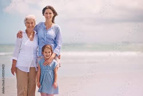 Theyre the leading ladies in their family story. Portrait of a woman with her daughter and mother at the beach.