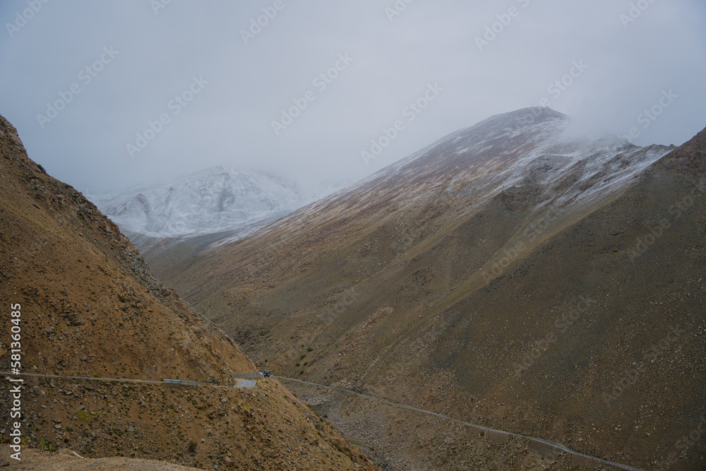 rolling hills and clouds on the top of the mountain at Ladakh, Leh, India