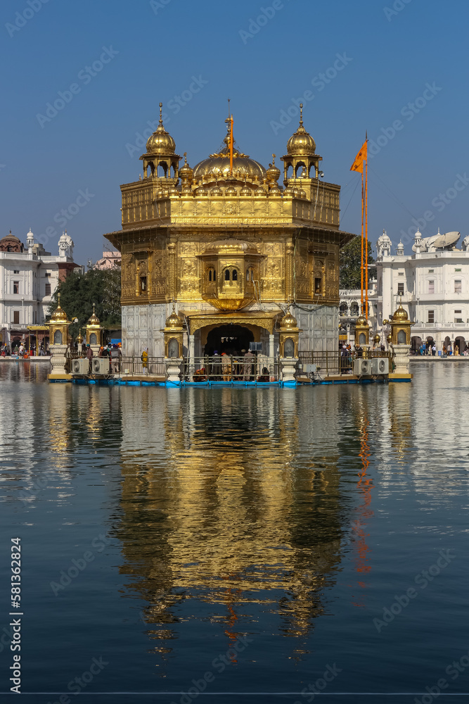 Darbar Sahib Golden Temple Amritsar with its reflection sarovar Nishan Sahib Punjab Tourism