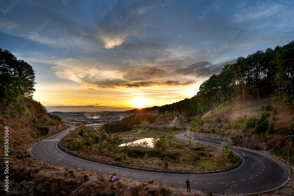 Sunset in Ta Nung Pass in Da Lat City, Vietnam. The winding road in the distance is Da Lat city