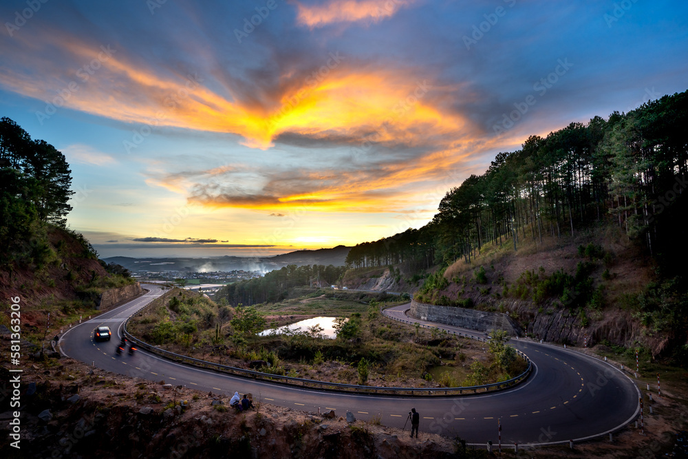 Sunset in Ta Nung Pass in Da Lat City, Vietnam. The winding road in the distance is Da Lat city