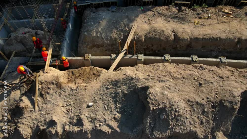 Construction workers in building a city park sewer line in Mexico city, 4K video Construction workers in building a city park sewer line in Mexico city, 4K video