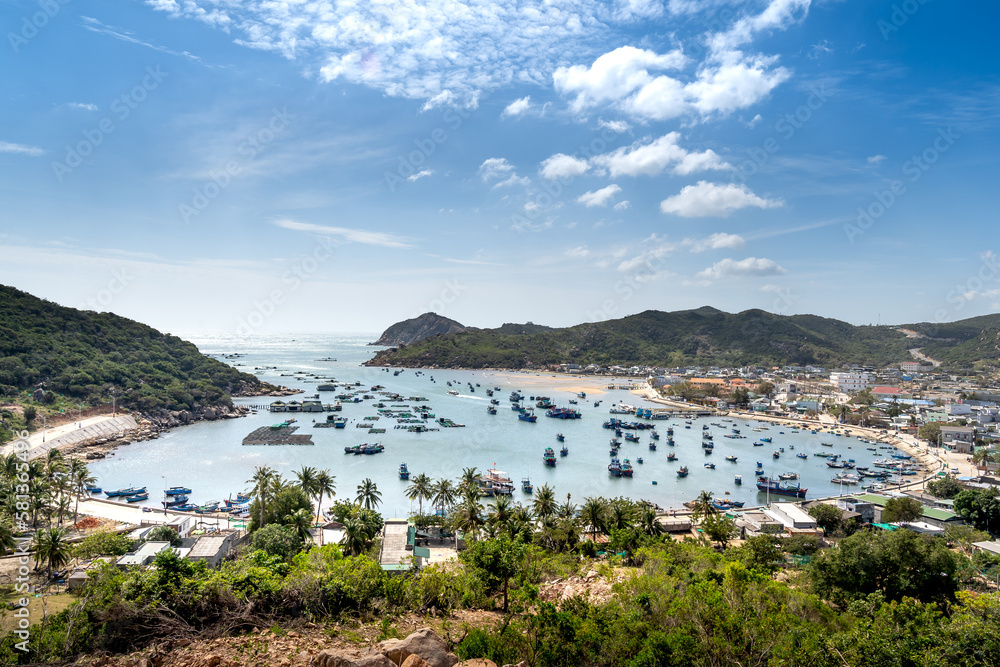 The beautiful panoramic landscape of Vietnam beach, Vinh Hy bay, Ninh Thuan, with group of boats are anchoring at fishing village