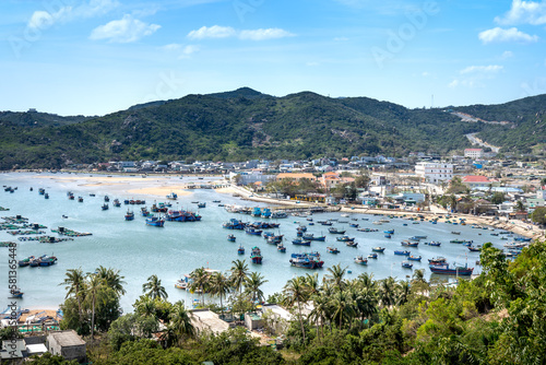 The beautiful panoramic landscape of Vietnam beach, Vinh Hy bay, Ninh Thuan, with group of boats are anchoring at fishing village