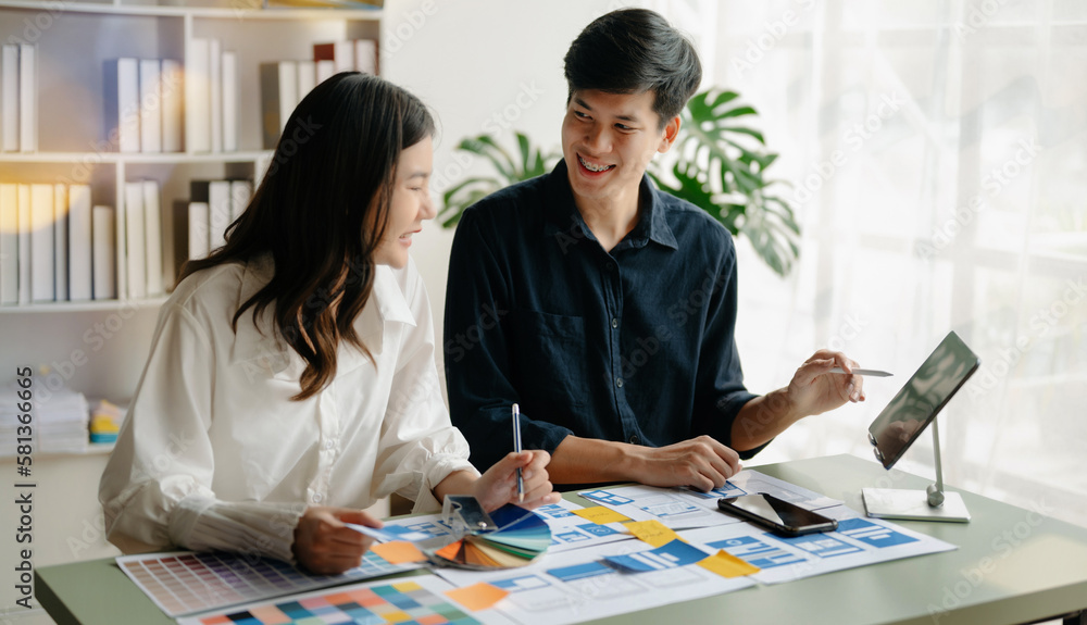 Obraz premium Asian businessman and woman people meeting in office. Employee brainstorm and work as team, plan and discuss project by point on paper and tablet.