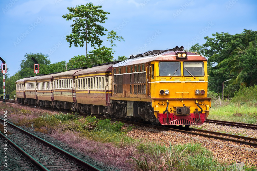 Passenger train by diesel locomotive on the railway. Passenger train by diesel locomotive on the railway.