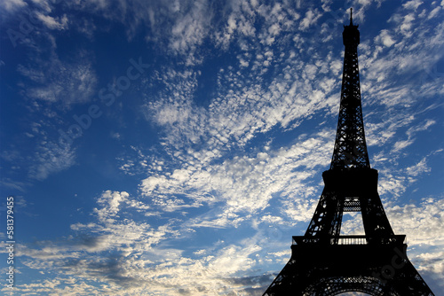 Fototapeta Naklejka Na Ścianę i Meble -  Eiffel Tower against the background of a beautiful sky with clouds. Paris, France