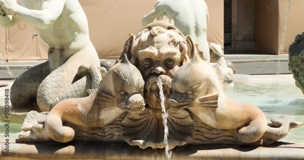 Detail of the Dragons and masks of the Moor Fountain (Fontana del Moro), Piazza Navona in Rome, Italy. Detail of the Dragons and masks of the Moor Fountain (Fontana del Moro), Piazza Navona in Rome, Italy.
