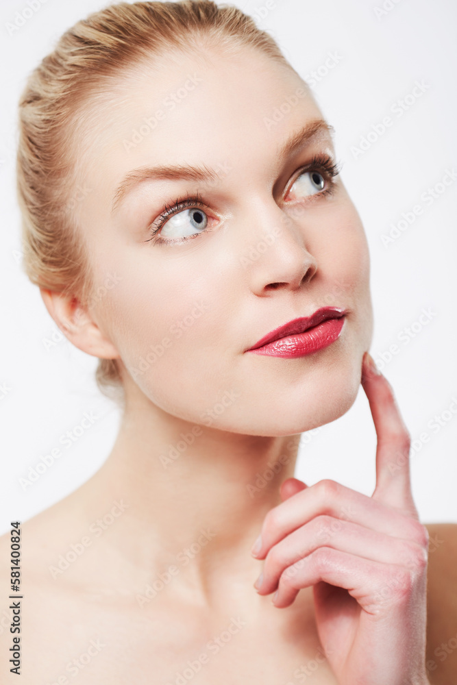 Contemplating the essence of beauty. Portrait of a beautiful model pouting and looking to the side thoughtfully. Contemplating the essence of beauty. Portrait of a beautiful model pouting and looking to the side thoughtfully.