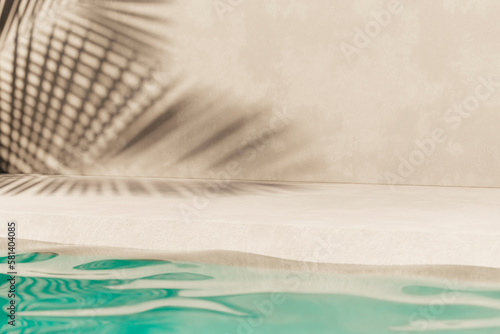 Fototapeta Tropical summer background with concrete wall, pool water and palm leaf shadow