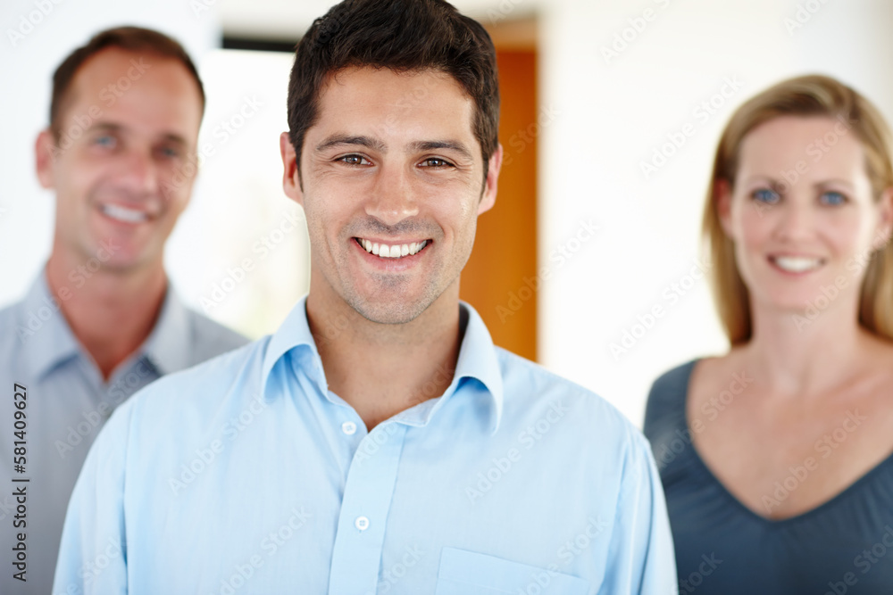 Time to train these men. three smiling colleagues in their office. Time to train these men. three smiling colleagues in their office.