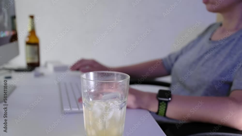 Weekend at home for a nice game of computer games on a desktop computer with a huge 5k monitor and a glass of beer. Slider movement to the right Weekend at home for a nice game of computer games on a desktop computer with a huge 5k monitor and a glass of beer. Slider movement to the right