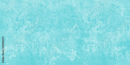 Light teal crack pattern wide wall. Pastel blue shabby textured background. Widescreen texture