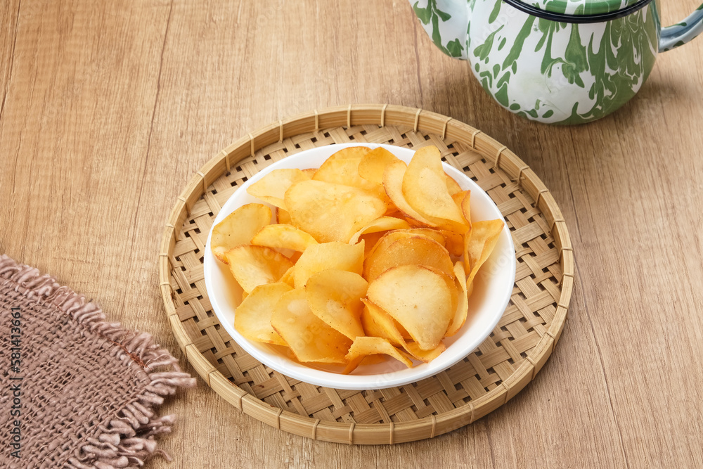 Keripik Singkong Keju or Cheese Cassava Chips, Indonesian traditional snack.
Keripik Singkong Keju or Cheese Cassava Chips, Indonesian traditional snack.