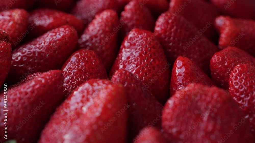 Delicious big ripe red strawberries in rotation Delicious big ripe red strawberries in rotation