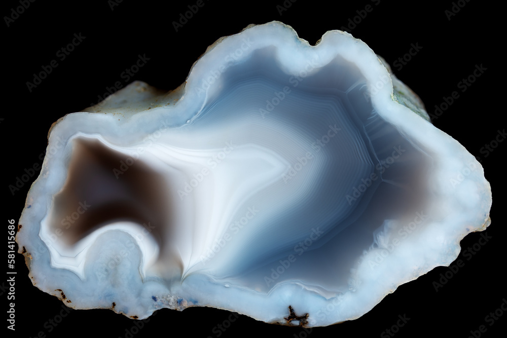 A sample of agate stone with a smooth black-white-blue pattern A sample of agate stone with a smooth black-white-blue pattern
