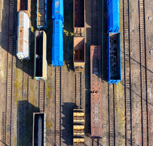 Obraz na płótnie Aerial view landscape. View of railroad tracks and trains, wagon, cargo. w salonie