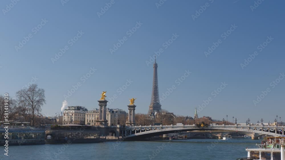 Eiffel tower and golden statues of Alexandre bridge, static view Eiffel tower and golden statues of Alexandre bridge, static view