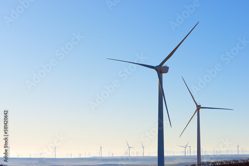 Silhouettes of windmills for the production of energy