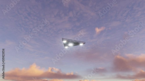UFO in the form of a triangle in fast moving clouds