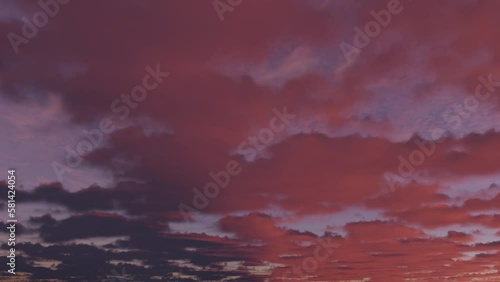 UFO in the form of a triangle in fast moving clouds