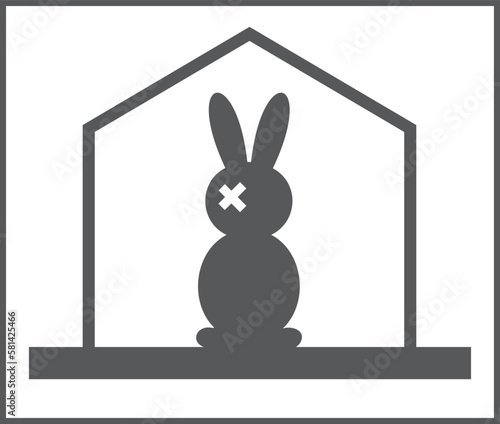 A rabbit sits alone at home and is sad. He has a plaster on his head
