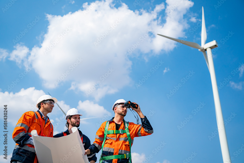 Wind turbine service engineer maintenance and plan for inspection at construction site, renewable electricity generator. Wind turbine service engineer maintenance and plan for inspection at construction site, renewable electricity generator.