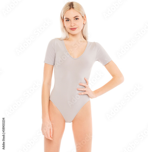 Portrait of a young blonde woman in gray bodysuit © Andrey_Arkusha