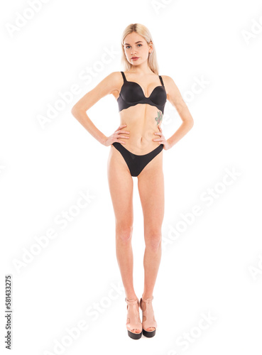 Full body portrait of a young beautiful blonde woman