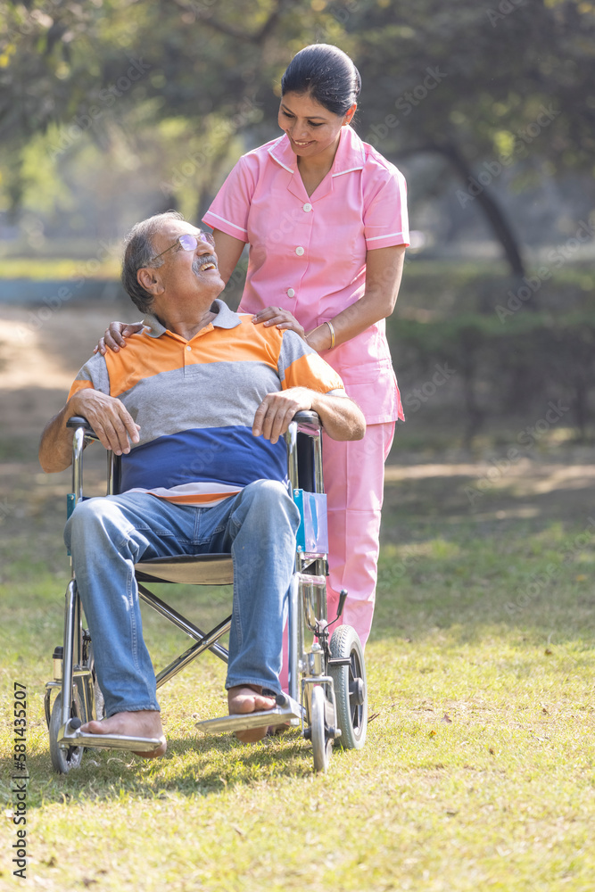 Senior man making physiotherapy session with young nurse. Senior man making physiotherapy session with young nurse.