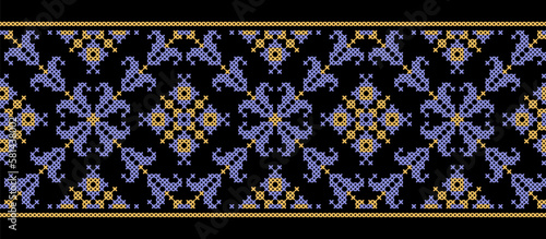 Ukrainian folk ethnic traditional ornament .Vector floral pattern, seamless border. Ukrainian embroidery ornament in gold and violet colors on black background. Pixel art, vyshyvanka, cross stitch