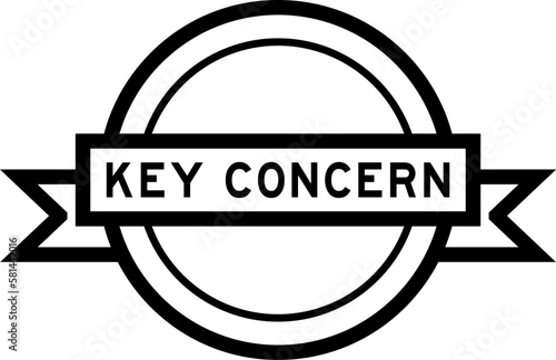 Vintage black color round label banner with word key concern on white background