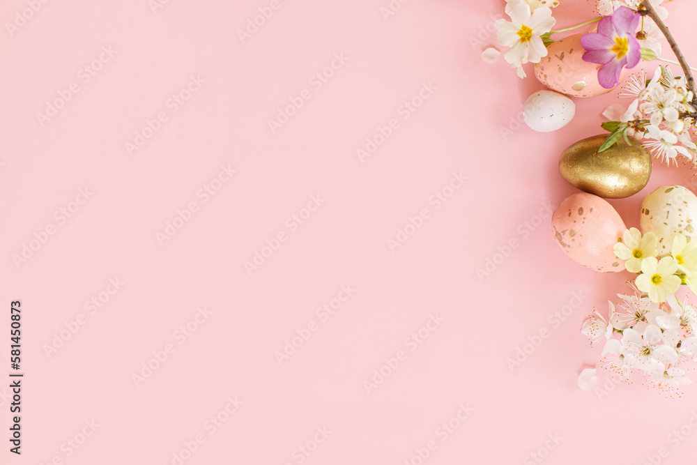 Easter flat lay with stylish eggs and blooming flowers on pink background. Happy Easter! Modern festive template with space for text. Greeting card or banner Easter flat lay with stylish eggs and blooming flowers on pink background. Happy Easter! Modern festive template with space for text. Greeting card or banner