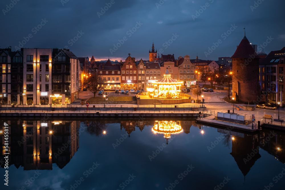 Fototapeta premium Old town in Gdansk by the Motlawa river at dusk, Poland.